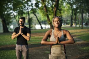 Practicing yoga can reduce stress and improve your health.